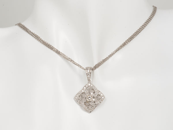Antique diamond pendant with diamond center 16" chain